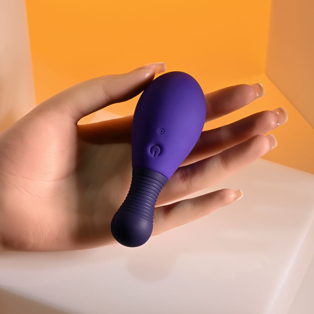 Selopa EGG ME ON -  10 cm USB Rechargeable Egg with Wireless Remote held in hand