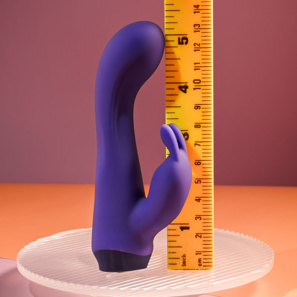 Selopa PLUM JOB - 13.5 cm USB Rechargeable Rabbit Vibrator next to a ruler for size comparison