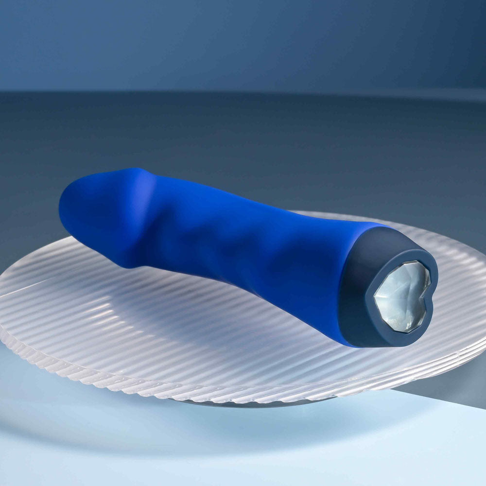 Selopa  BANGER - 13.6 cm USB Rechargeable Vibrator on a plate, showcasing its wavy textured shaft and heart-shaped control button.