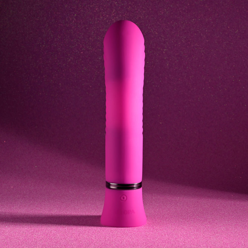 Selopa NEXT WAVE - 16.4 cm USB Rechargeable Dual Vibrator against a pink background highlighting its design and features.