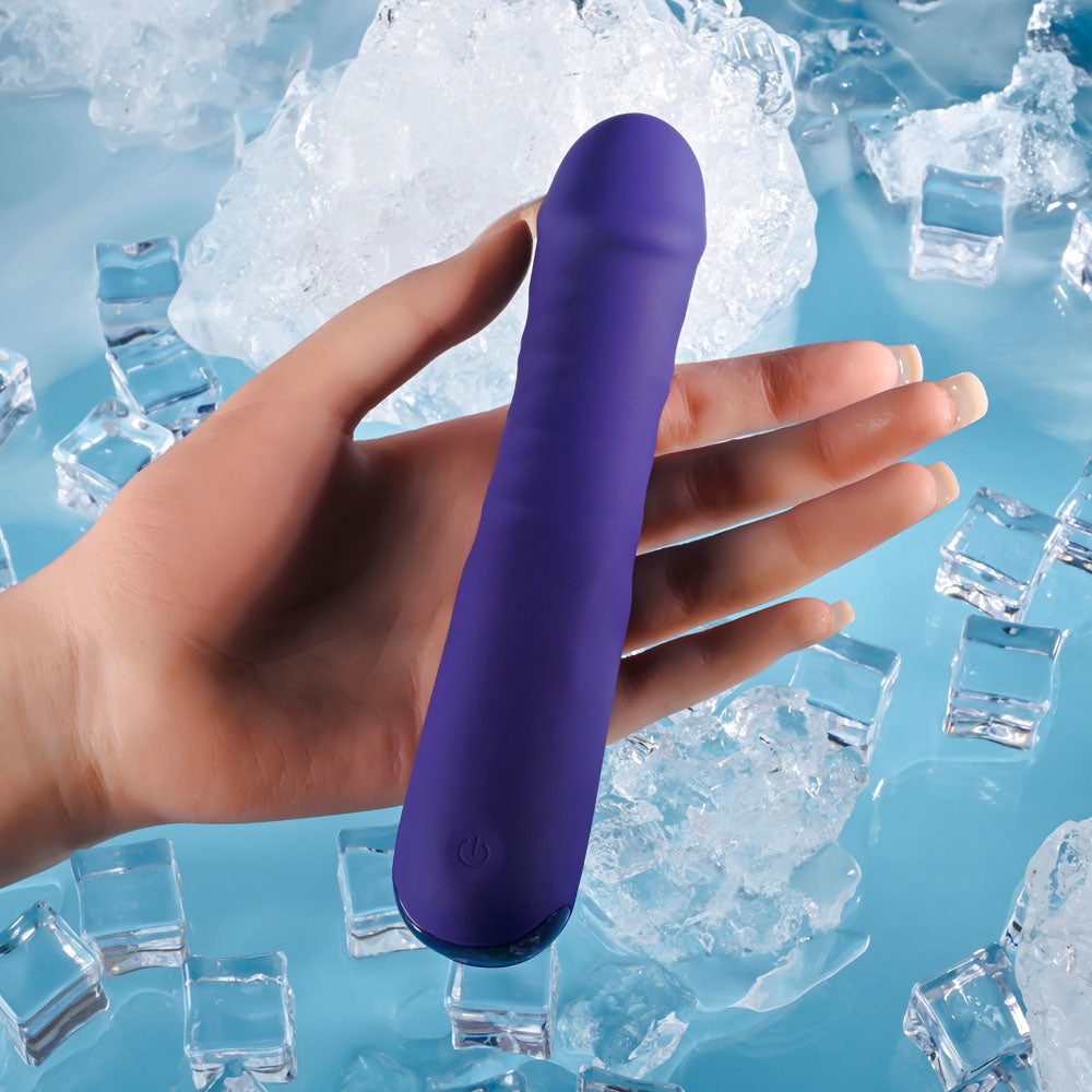 Selopa AMBITION - 17 cm USB Rechargeable Thrusting Vibrator held above ice cubes, showcasing its smooth design.