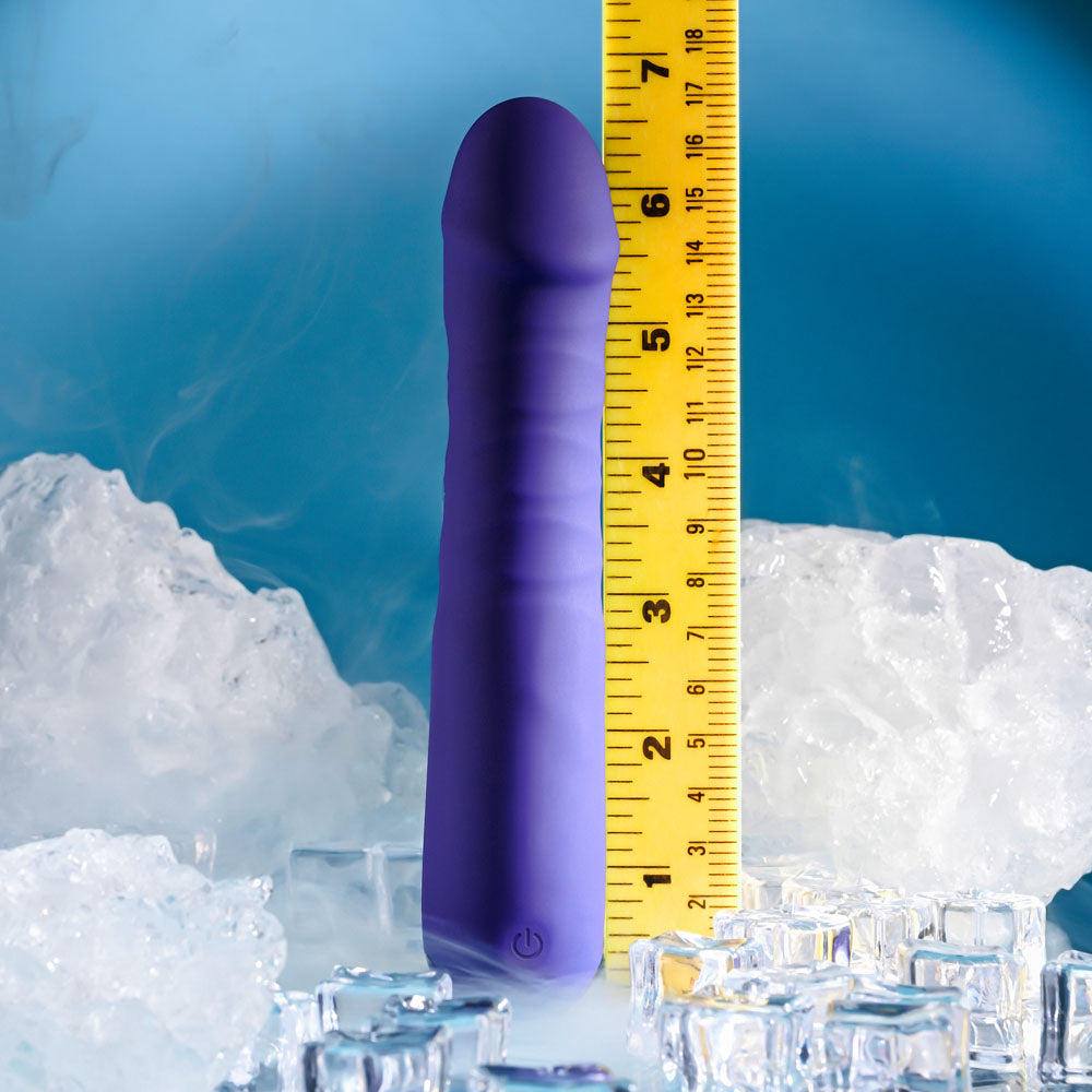 Selopa AMBITION - 17 cm USB Rechargeable Thrusting Vibrator next to a measuring tape on ice.