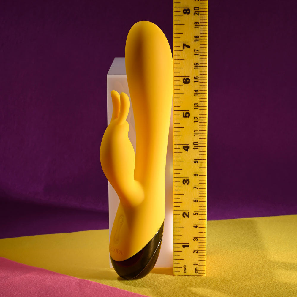 Selopa BUZZZ BUNNY - 19.7 cm USB Rechargeable Rabbit Vibrator next to a ruler for size reference.