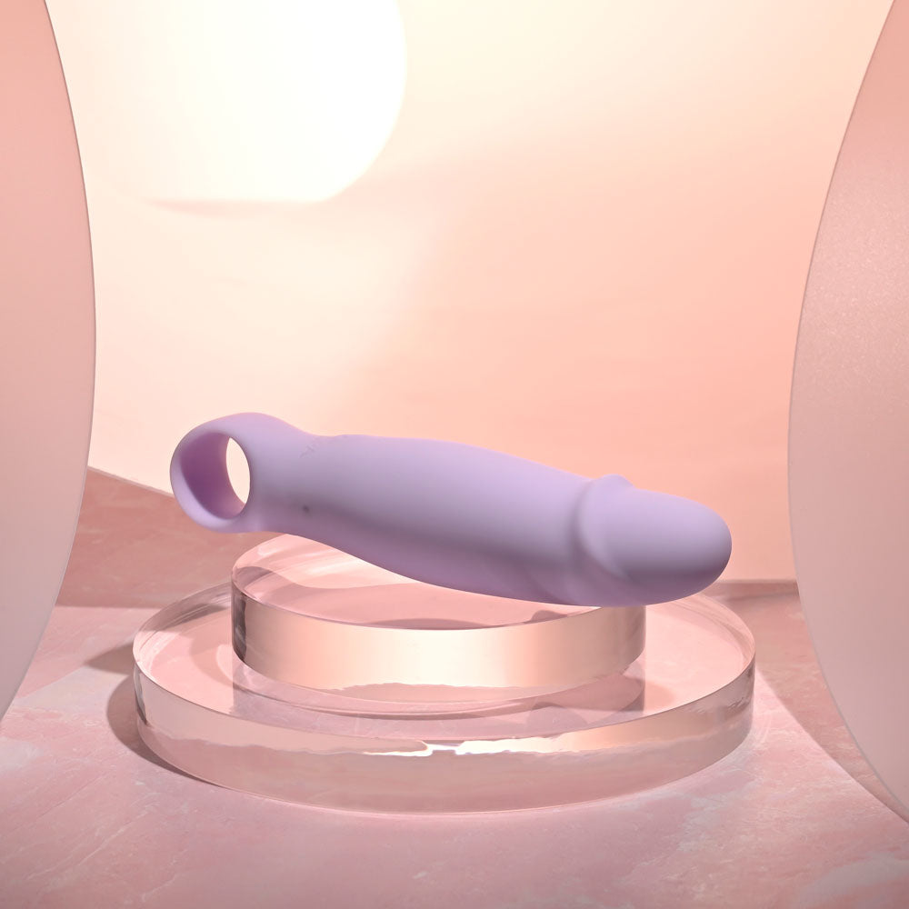 Selopa PETITE PECKER -  11.7 cm USB Rechargeable Mini Vibrator on a clear display, featuring a smooth silicone surface.