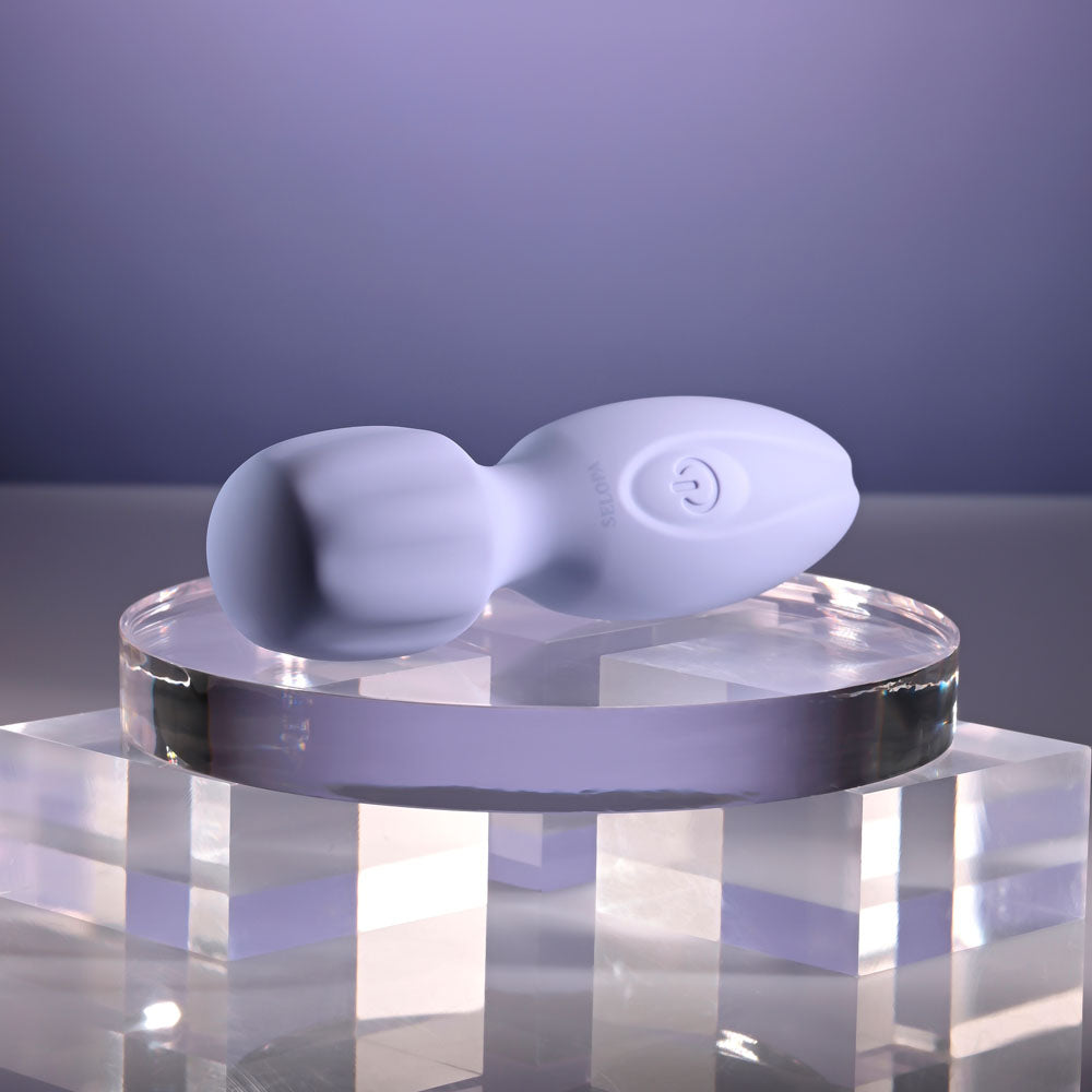 Selopa LIL' WAND -  11 cm USB Rechargeable Massage Wand on a crystal display with a soft texture and sleek design.