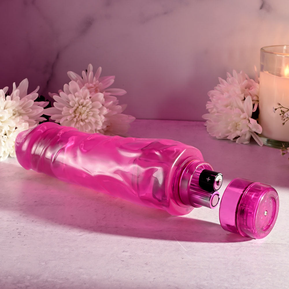 Selopa THICC BOI -  22.9 cm Vibrator in pink with floral background and candles for intimate essentials for her.