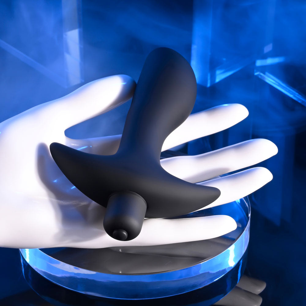 Selopa P-SPOT TRAINER - 12.7 cm Vibrating Prostate Massager on a hand, showcasing its sleek design for intimate essentials.