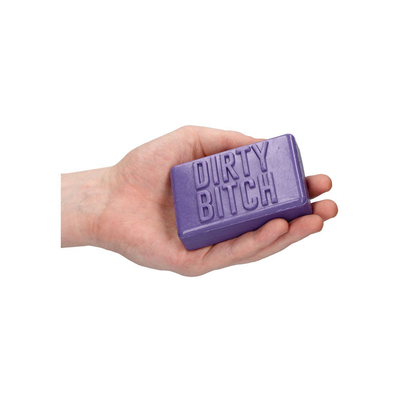 S-LINE Soap Bar - Dirty Bitch - Novelty Soap held in hand, featuring vibrant purple color and bold lettering.