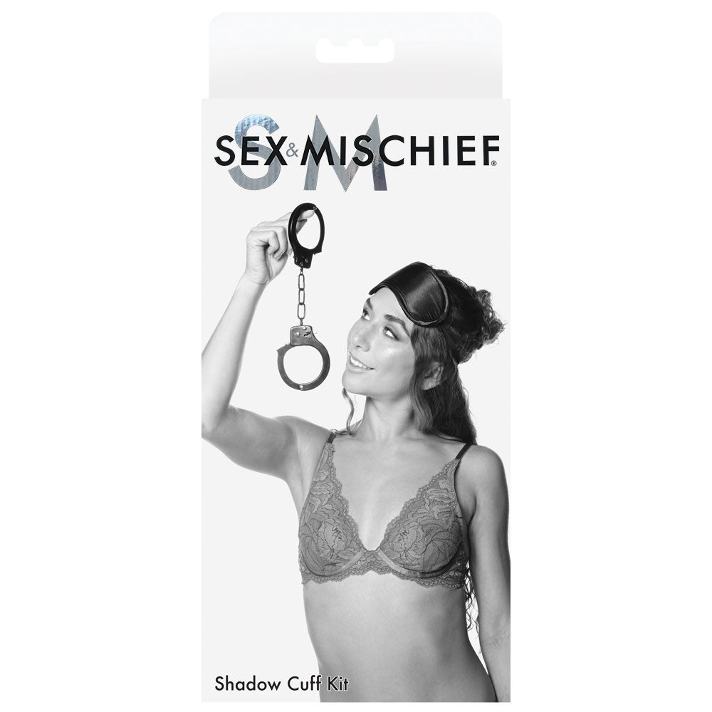 Sex & Mischief Shadow Cuff Kit -  - 2 Piece Set packaging with model featuring handcuffs and blindfold.
