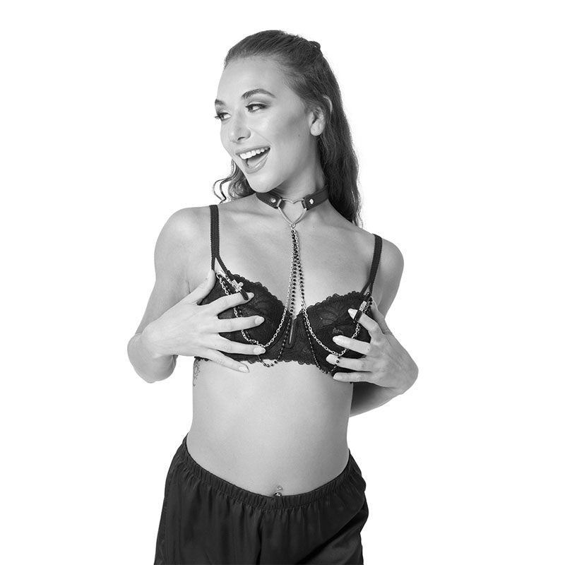 Sex & Mischief Amor Collar with Nipple Clamps - Metal Restraints model showcasing playful teasing in black lingerie.