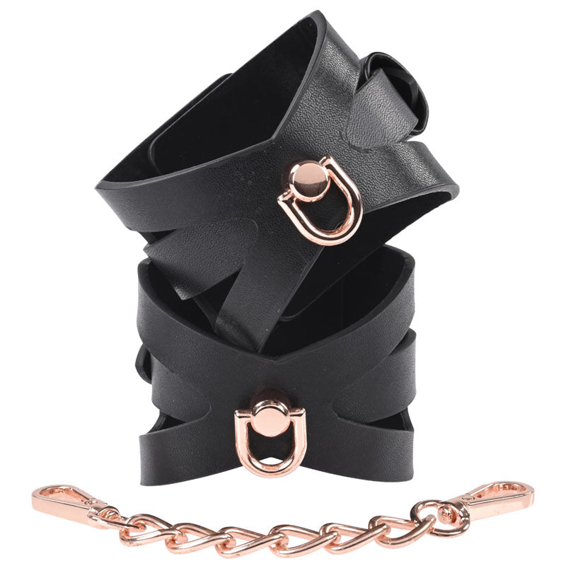 Sex & Mischief Brat Handcuffs - /Rose Gold Restraints featuring elegant black leather and chic rose gold accents.