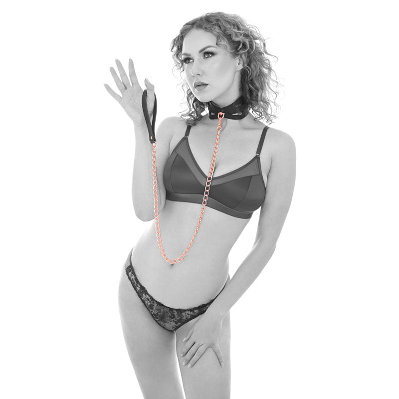 Sex & Mischief Brat Collar & Leash - /Black Restraint showcased on a model with a rose gold chain and elegant design.