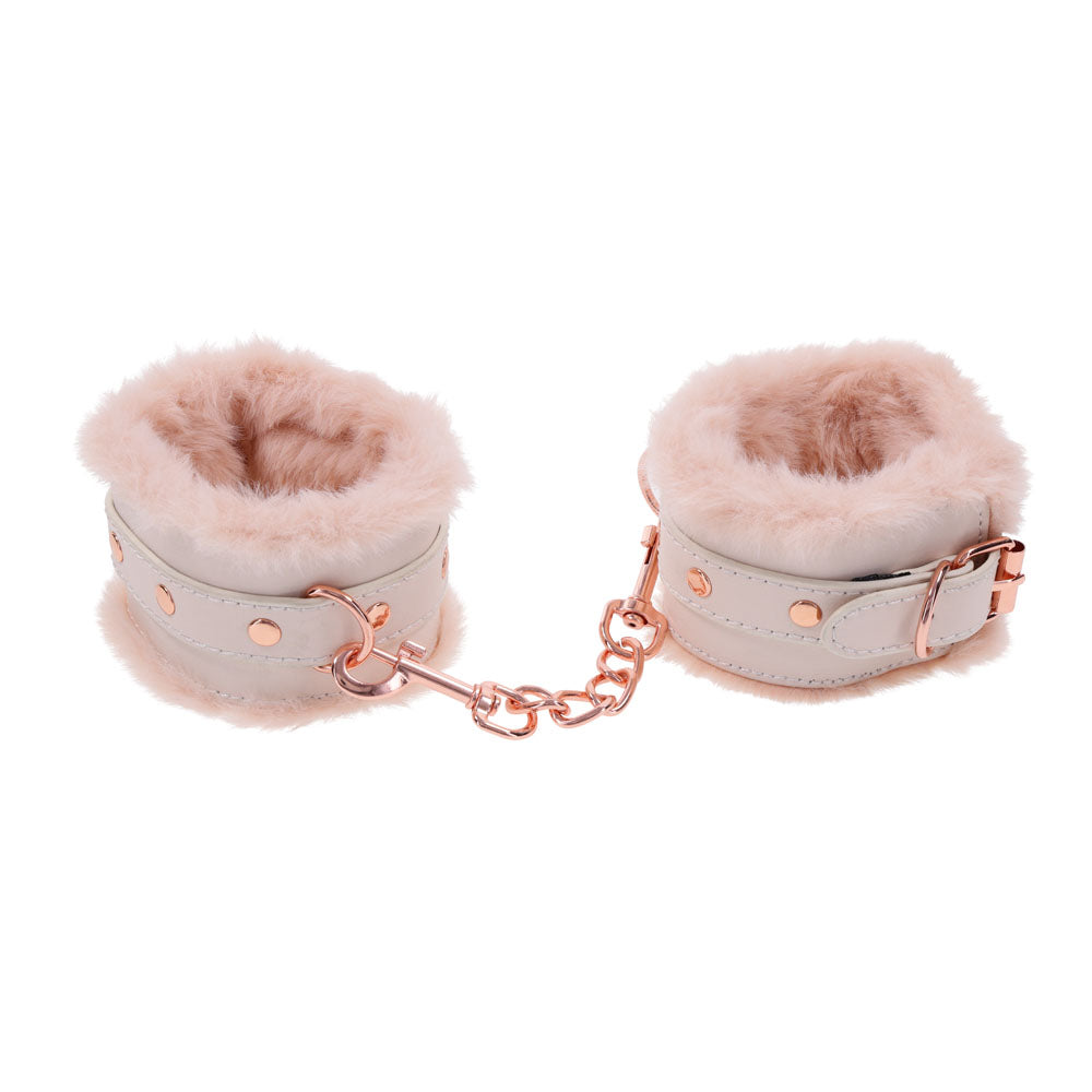 Sex & Mischief Peaches n CreaMe Fur Handcuffs - Peach Restraints with plush faux fur and rose gold hardware.