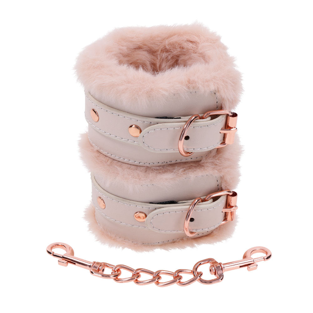 Sex & Mischief Peaches n CreaMe Fur Handcuffs - Peach Restraints with luxurious faux fur and rose gold accents.