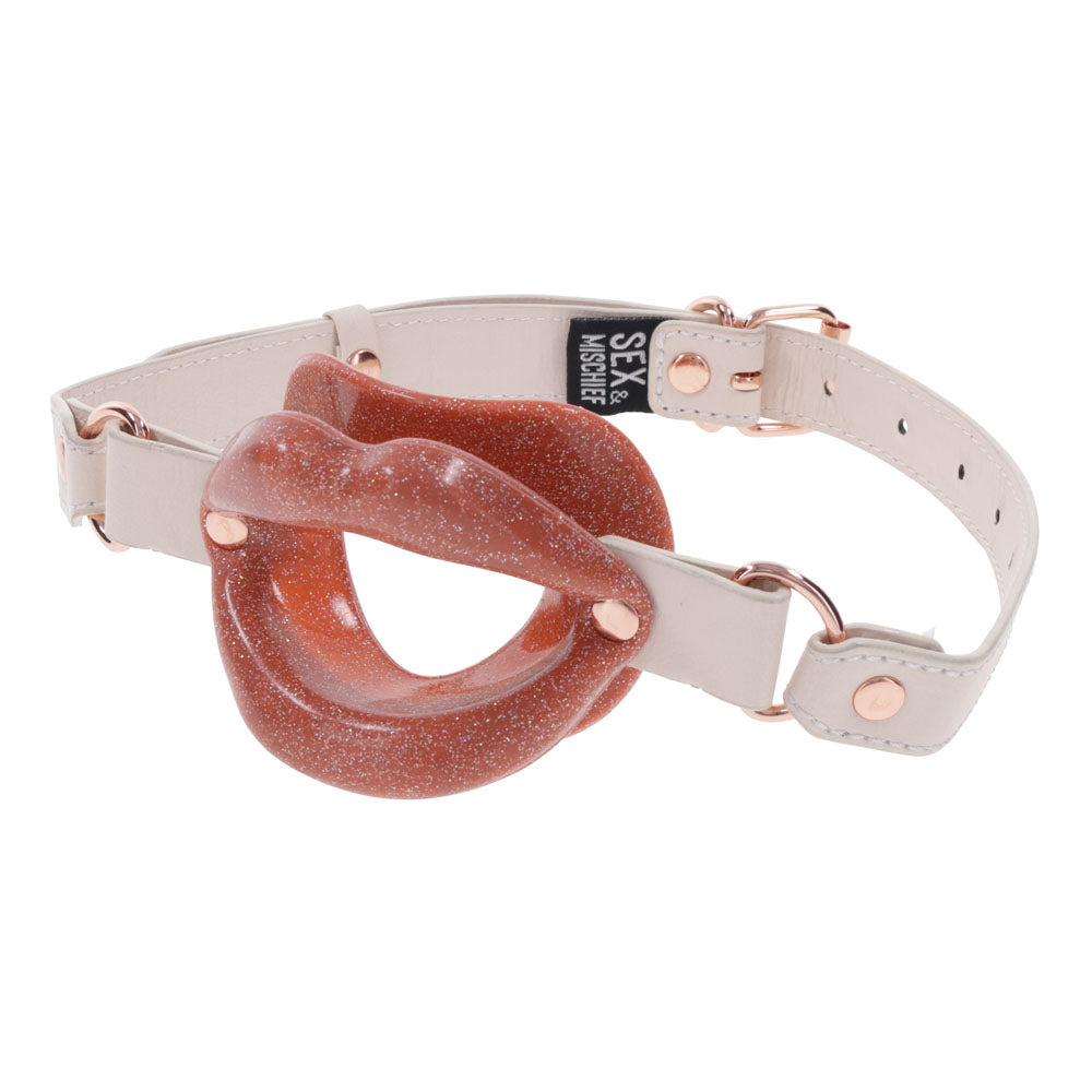Sex & Mischief Peaches n CreaMe Silicone Lips - Peach Mouth Restraint with faux leather buckle for secure fit.