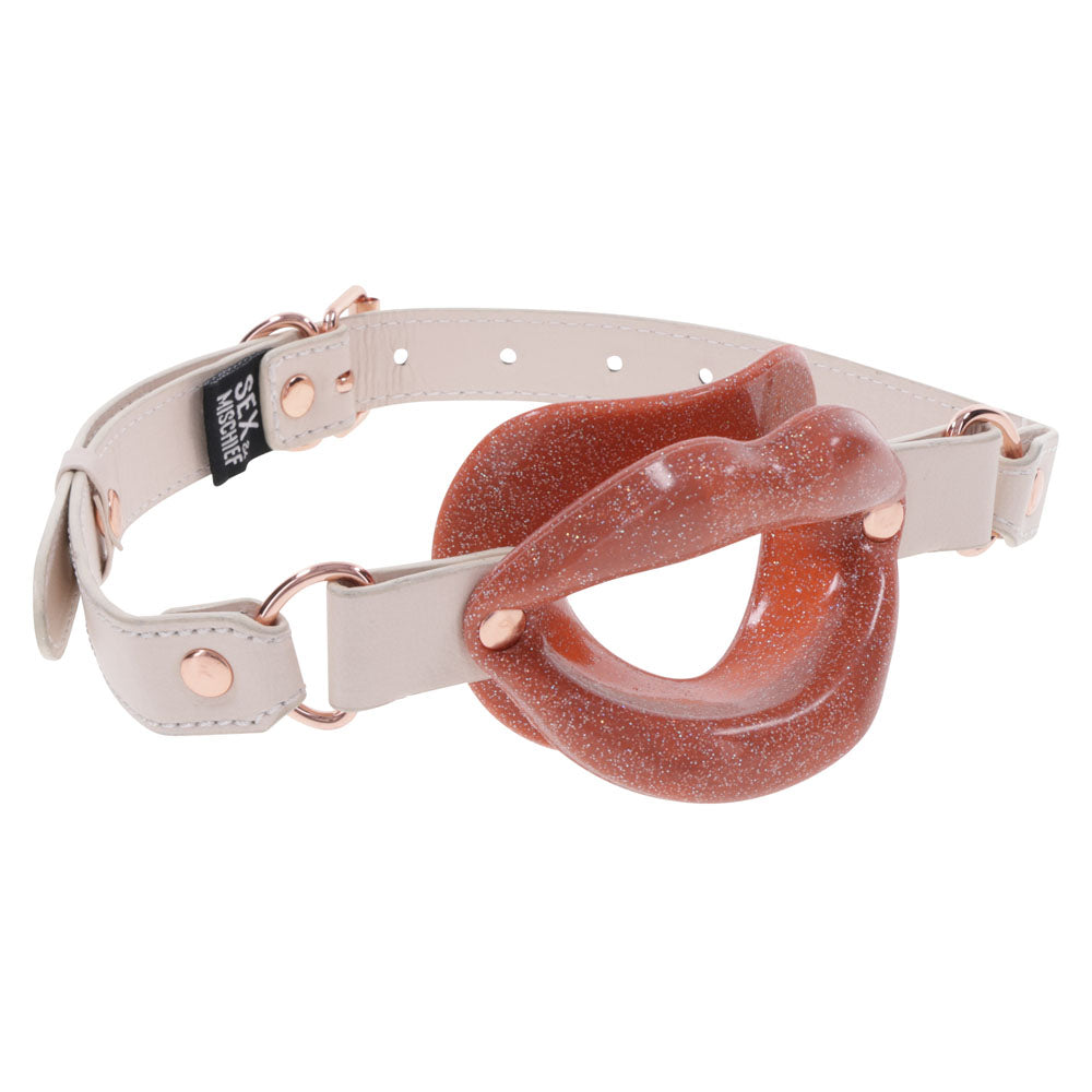 Sex & Mischief Peaches n CreaMe Silicone Lips - Peach Mouth Restraint with faux leather buckle design.
