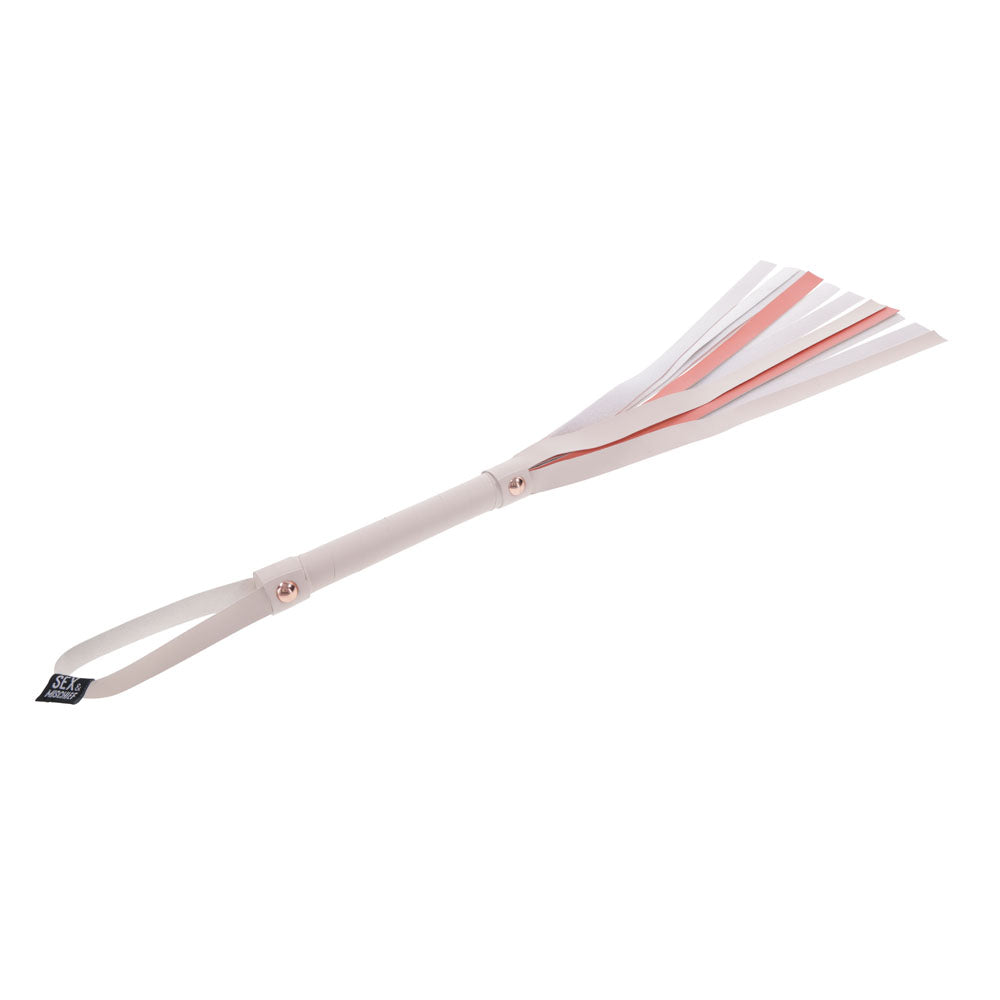 Sex & Mischief Peaches n CreaMe Stripe Flogger - Peach 80 cm Flogger Whip featuring playful peach-toned faux leather strands.