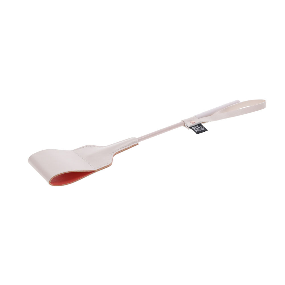 Sex & Mischief Peaches n CreaMe Riding Crop - Peach 30 cm Crop Whip with a sleek, bright peach faux leather design.