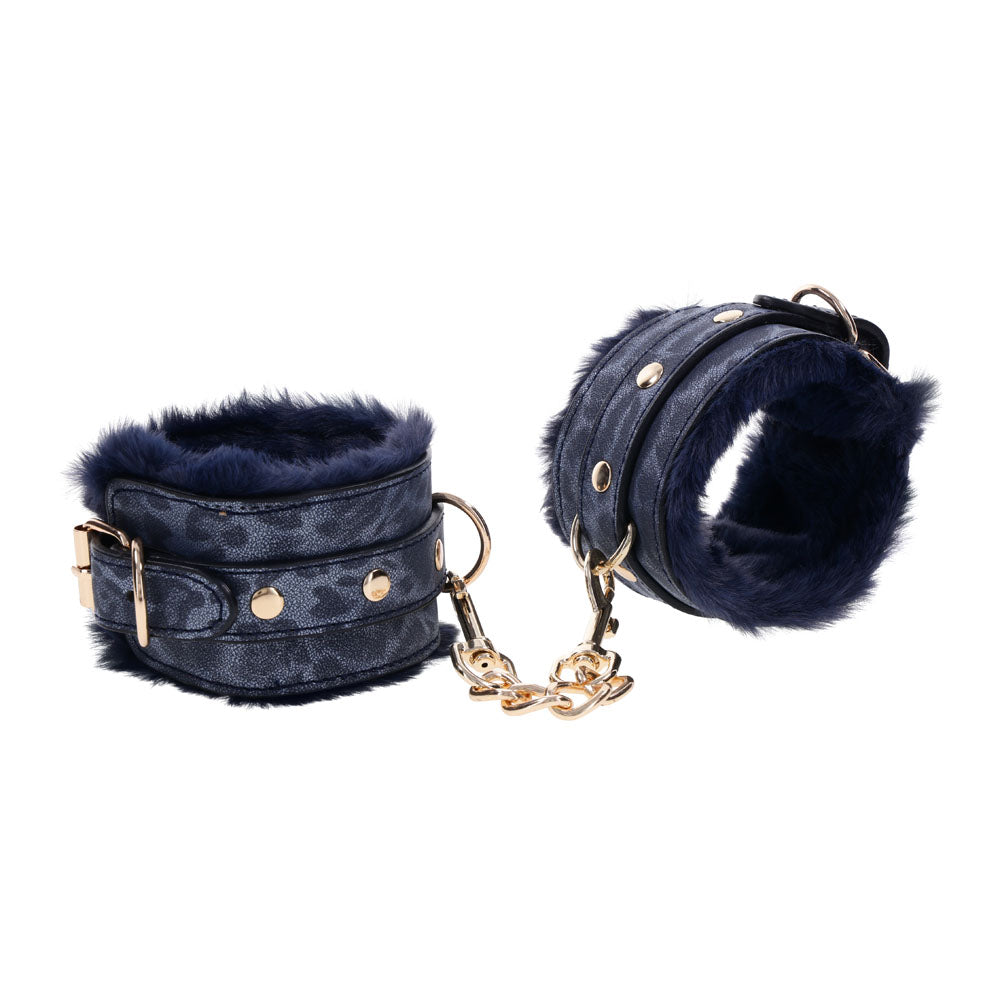 Sex & Mischief Cougar Fur Handcuffs - Navy /Gold Furry Restraints with plush blue fur and gold accents.