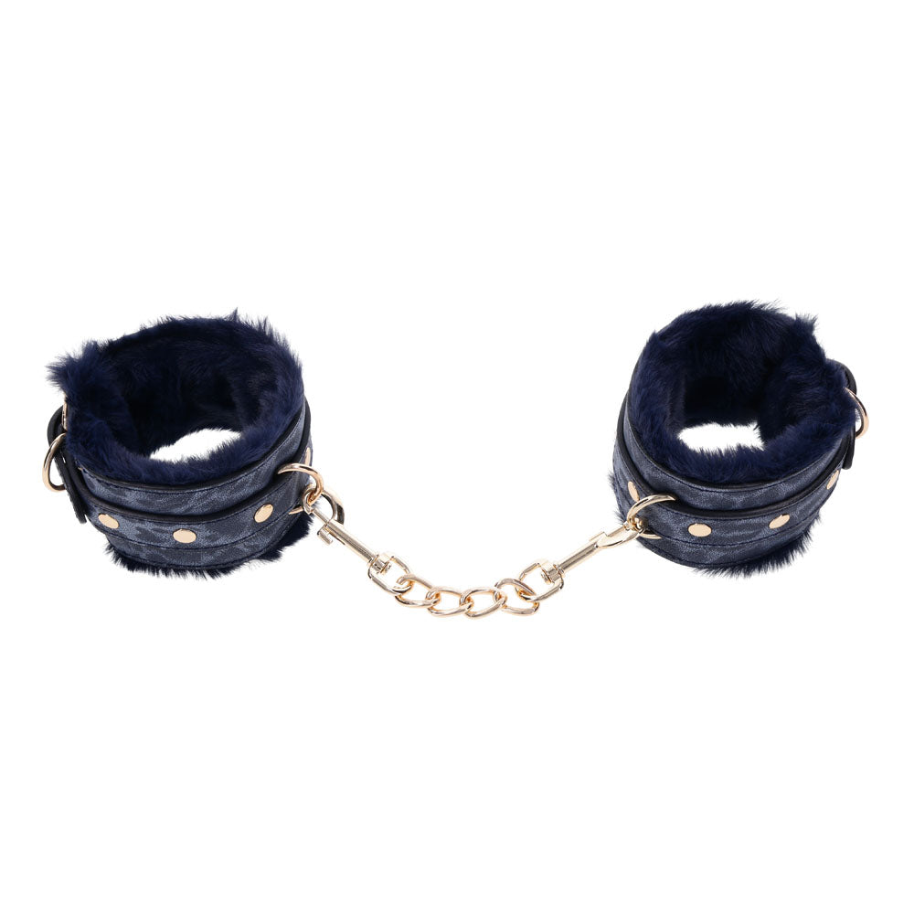 Sex & Mischief Cougar Fur Handcuffs - Navy /Gold Furry Restraints with faux fur lining and gold hardware.