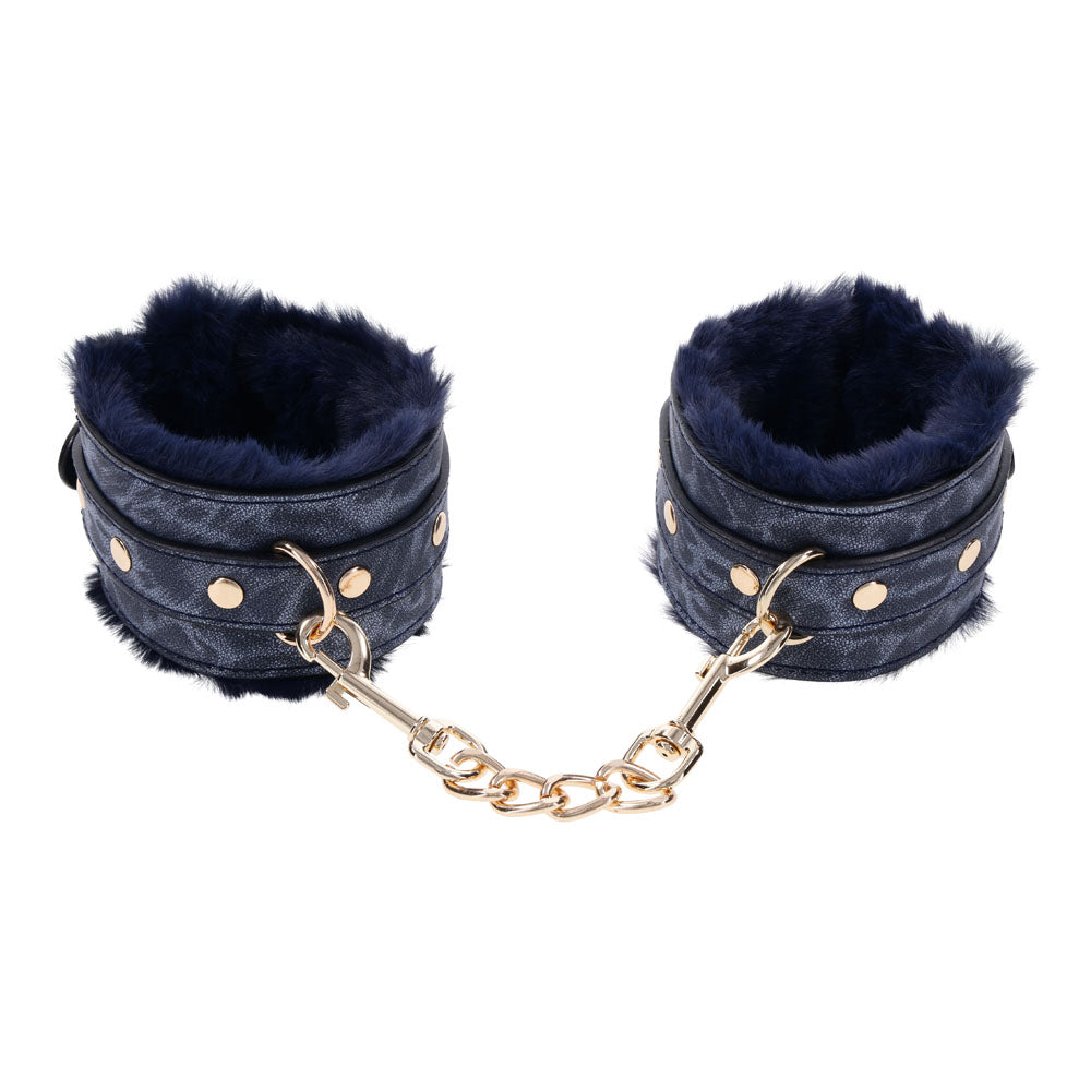 Sex & Mischief Cougar Fur Handcuffs - Navy /Gold Furry Restraints showcasing luxurious faux fur and gold hardware.