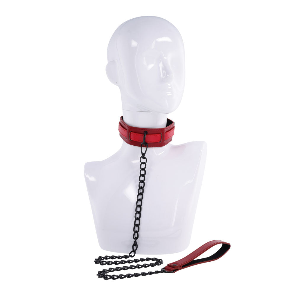 S&M Exs & Ohs Collar and Leash -  Neck Restraint featured on a mannequin with red collar and black chain leash.
