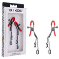 S&M Exs & Ohs Nipple Clamps -  Tipped Metal Nipple Clamps - Set of 2 showcased in elegant packaging.