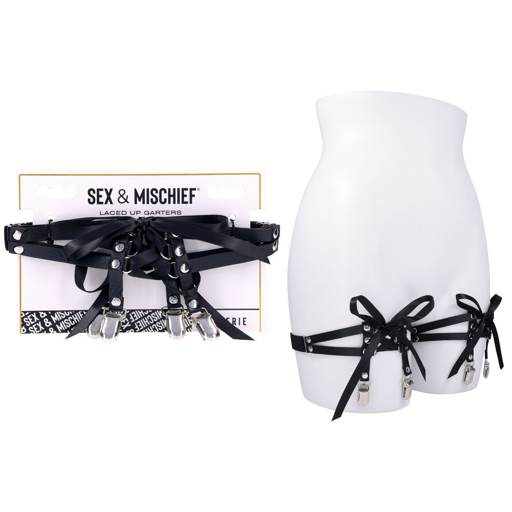 Sex & Mischief Laced Up Garters -  Garters on display with black satin ribbons and faux leather panels.