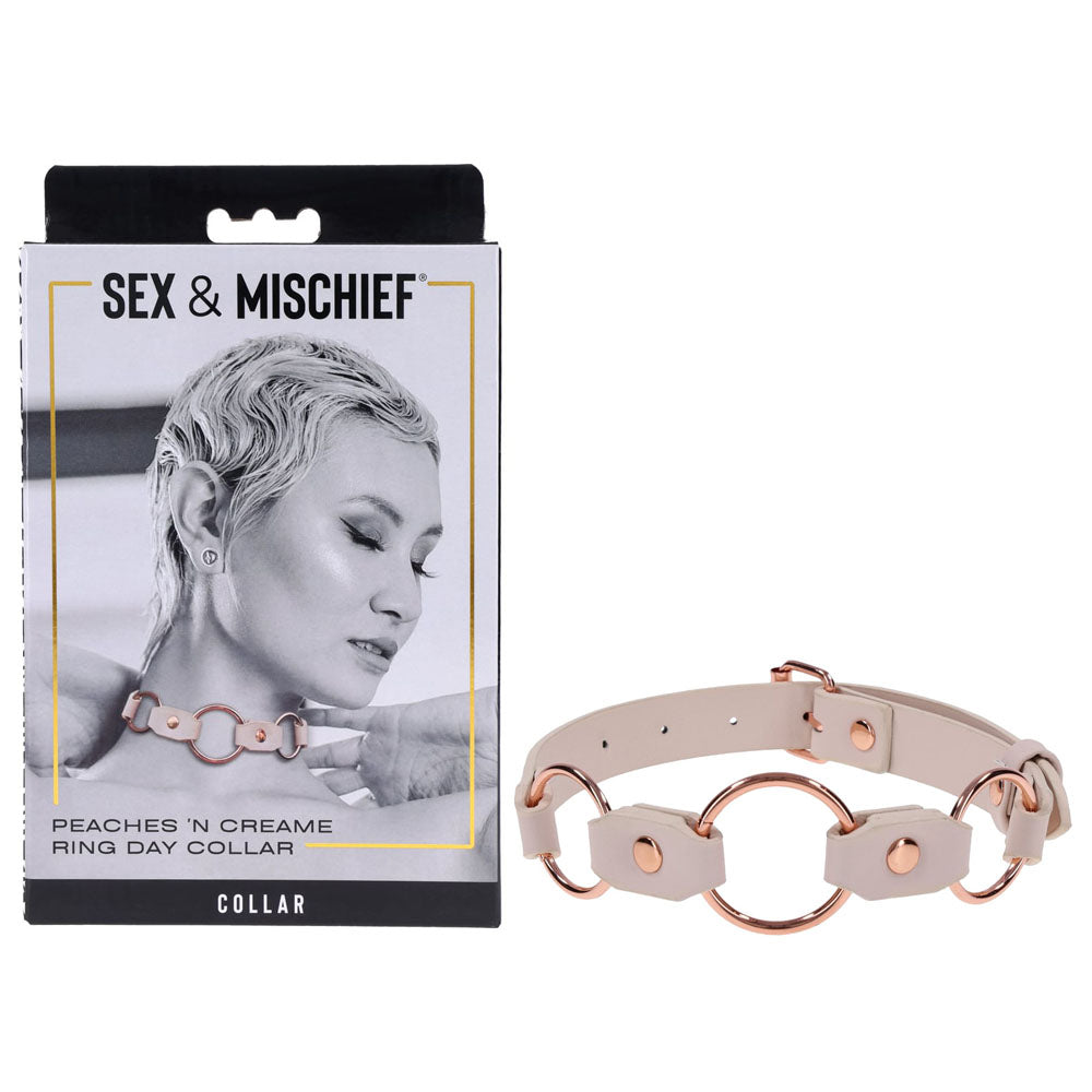 Sex & Mischief Peaches n CreaMe Ring Day Collar - Peach Bondage Collar displayed with packaging and model wearing it.