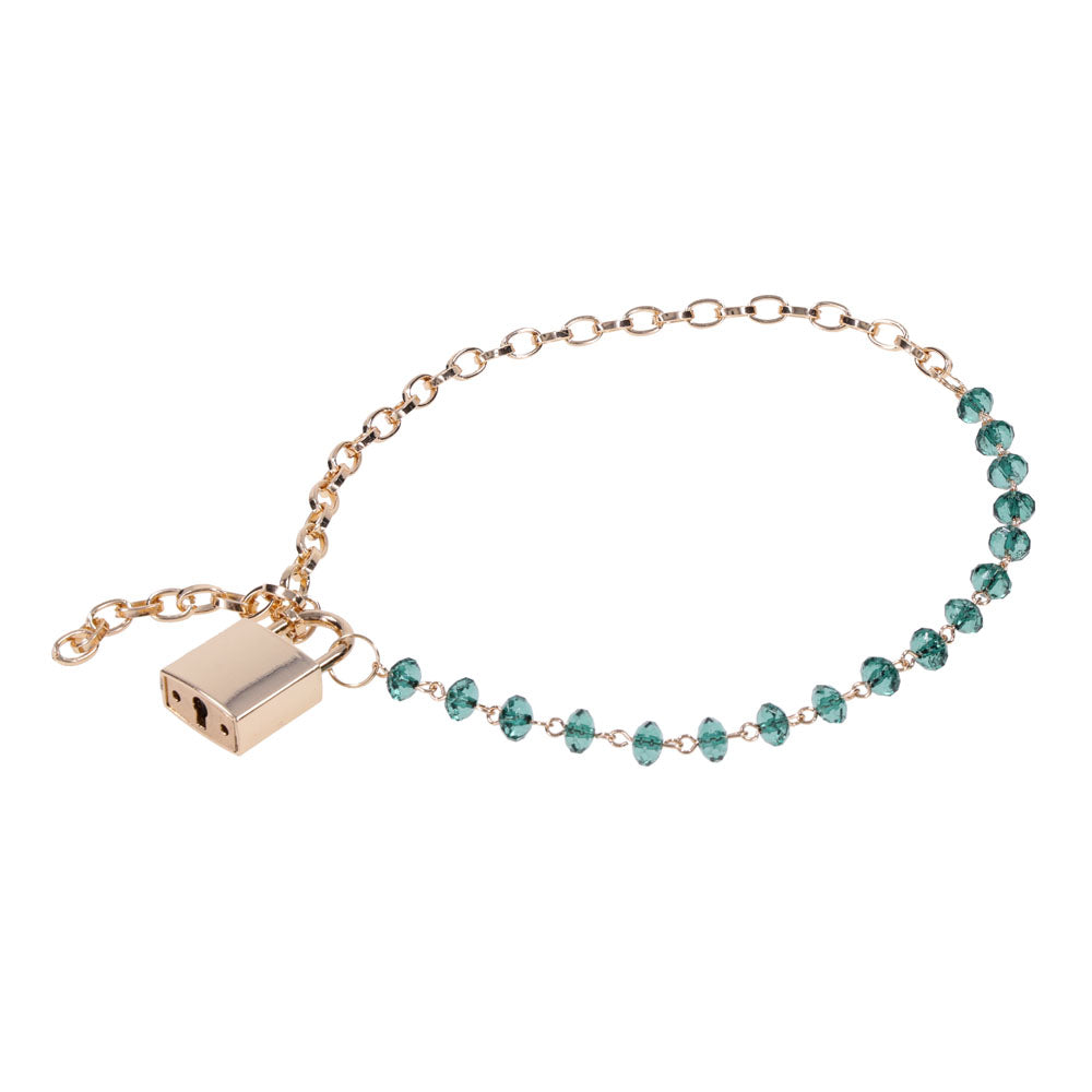 Sex & Mischief Indica Crystal Day Collar - Gold/Emerald Lockable Collar featuring green gems and a gold chain.