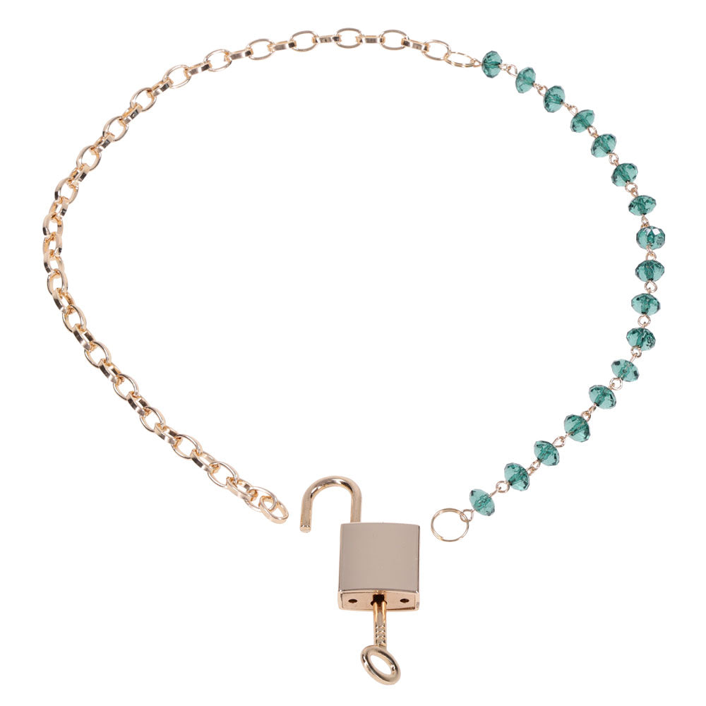 Sex & Mischief Indica Crystal Day Collar - Gold/Emerald Lockable Collar with green gem accents and a gold chain.