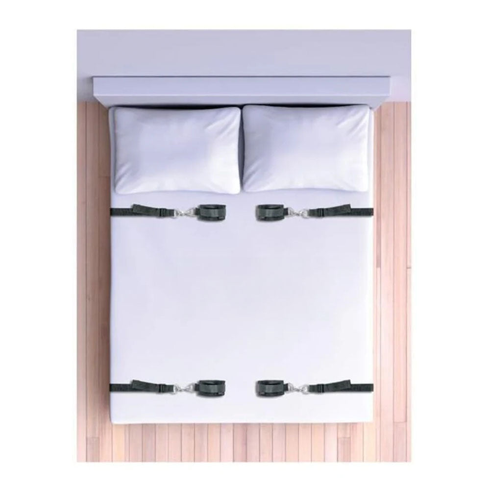 SPORTSHEETS Under The Bed Restraints - Bed Restraint System with adjustable cuffs and straps on a bed.