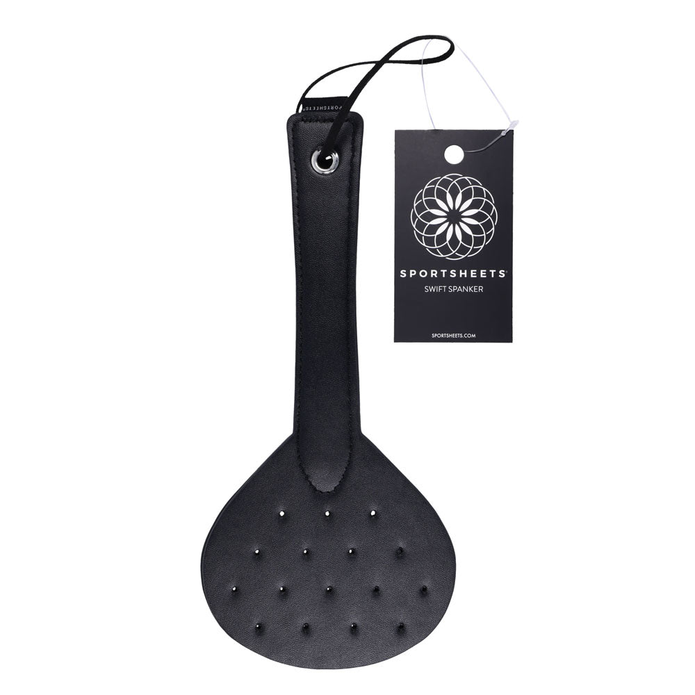 SPORTSHEETS Swift Spanker - Spanking Paddle with perforated design, perfect for intimate essentials and playful experiences.