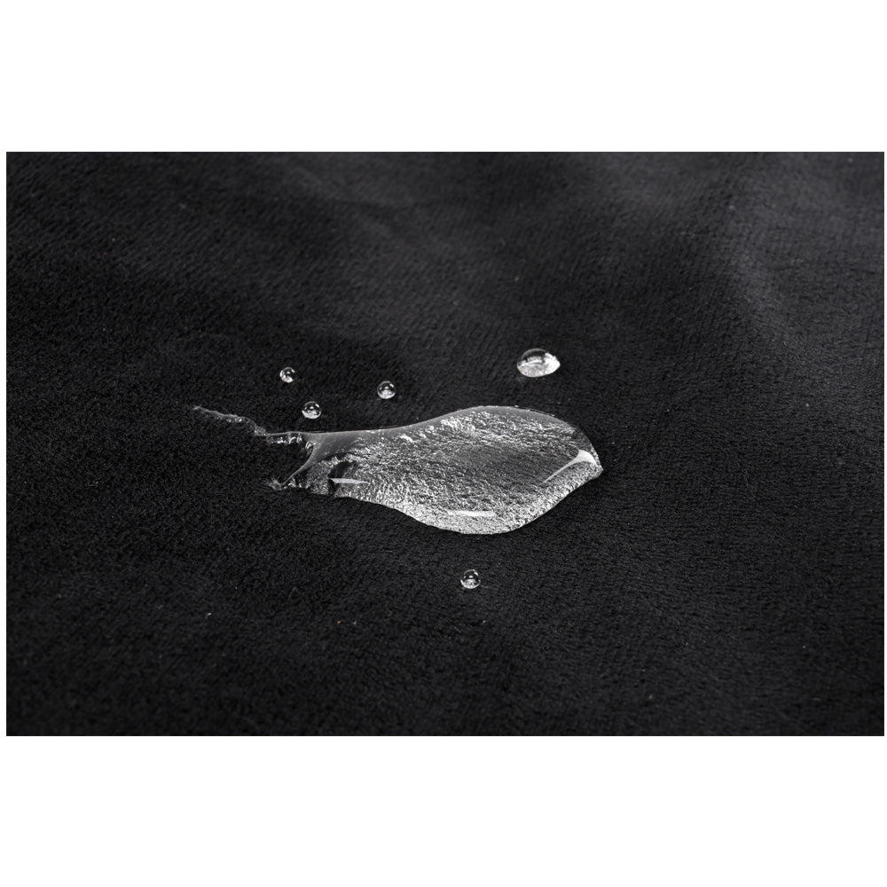 Pivot Protector -  Triple-Layered Waterproof Blanket displaying water beads on its surface for effective fluid protection.