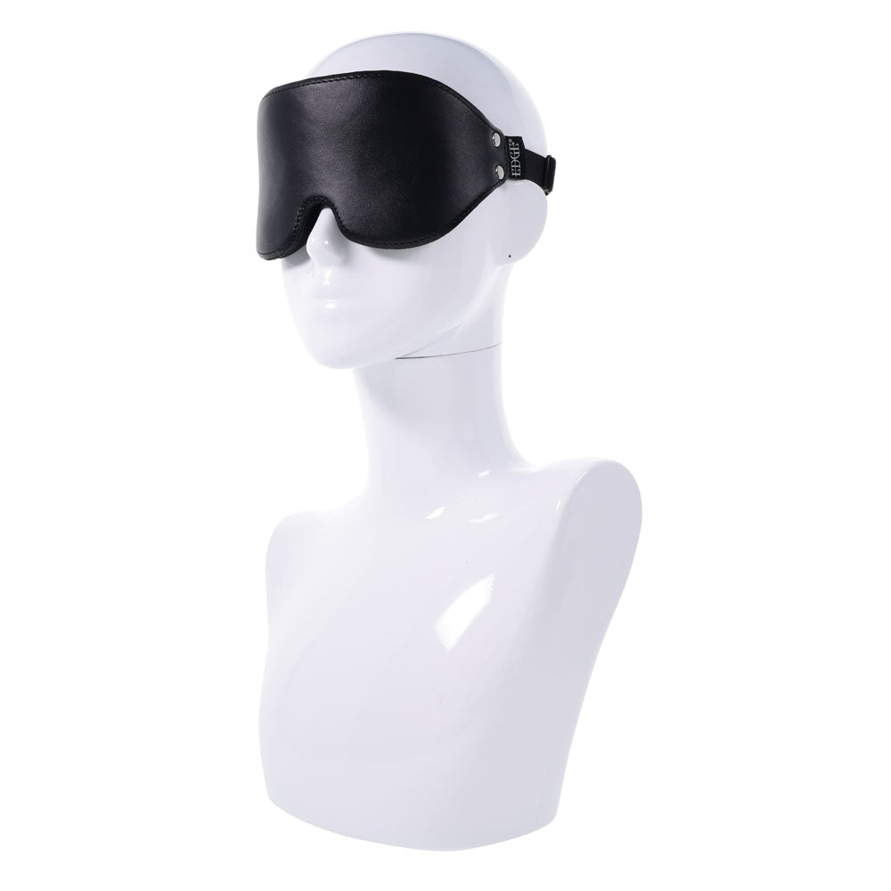 EDGE Lights Out Blindfold - Eyemask Restraint on a mannequin displaying a sleek faux leather design.