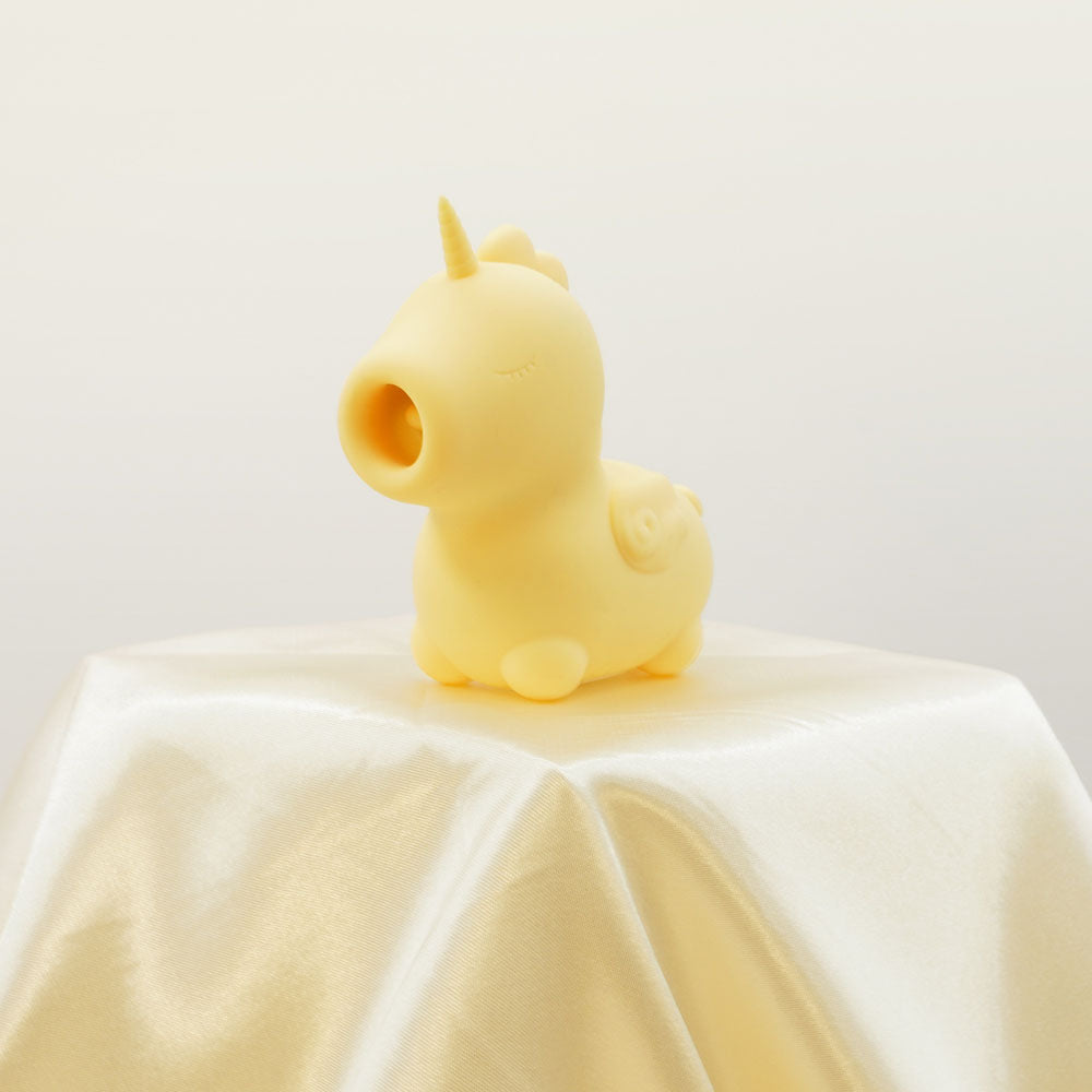 Unihorn - Bean Blossom - USB Rechargeable Flicking Stimulator on a silky surface, perfect for intimate essentials for her.