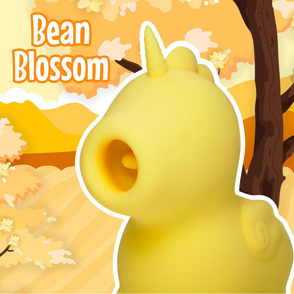 Unihorn - Bean Blossom -  USB Rechargeable Flicking Stimulator in a whimsical setting with autumn colors.