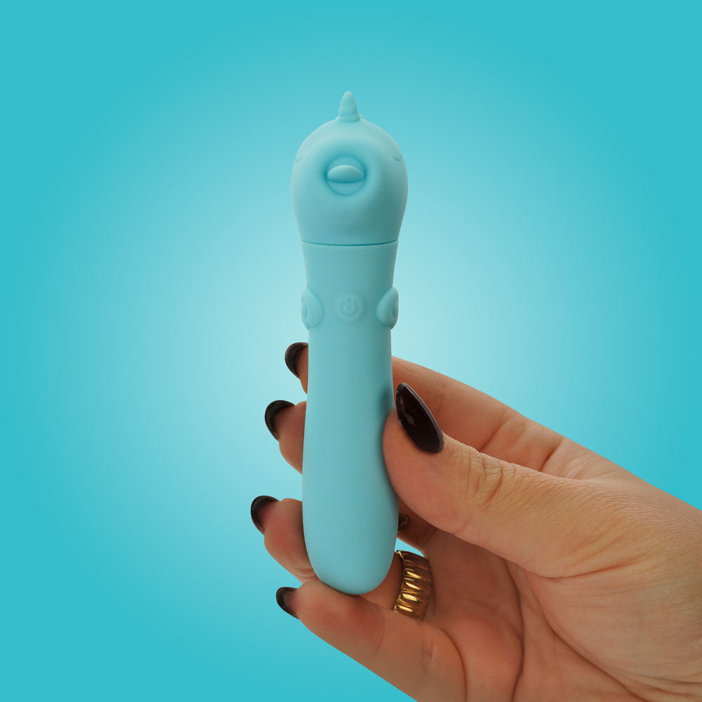 Unihorn - USB Bullet - Mount'n Peak - Teal USB Rechargeable Vibrating Bullet in hand on a blue background.