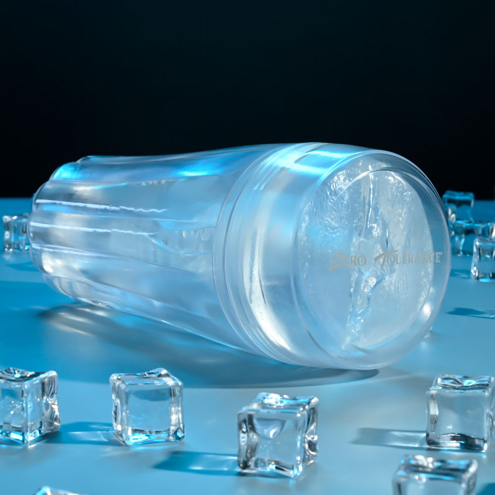 Zero Tolerance THE CHOICE - 21 cm Vagina Stroker surrounded by ice cubes, showcasing its sleek, crystal clear design.