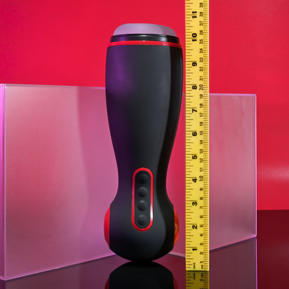 Zero Tolerance TIGHT SQUEEZE - USB Rechargeable Vibrating, Squeezing & Talking Stroker on display with measuring tape.