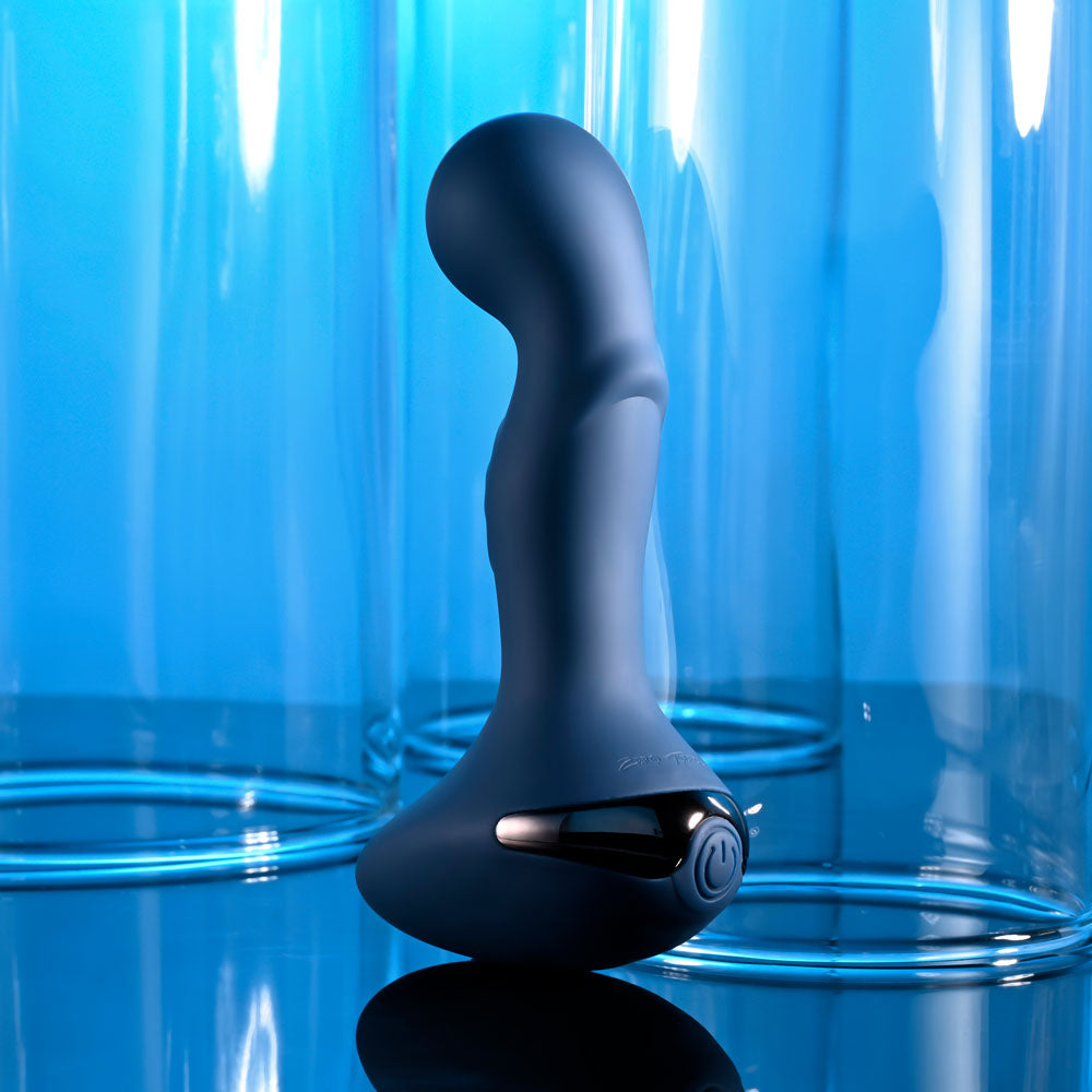 Zero Tolerance OASIS - 12.3 cm USB Rechargeable Vibrating Anal Plug displayed against a blue background.