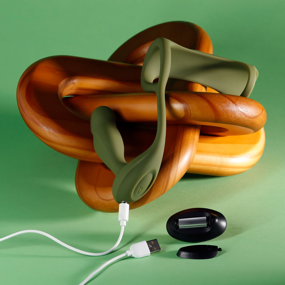 Zero Tolerance PROSTATE POWER PACK -  USB Rechargeable Vibrating Prostate Massager with Cock Ring Harness on a green background.