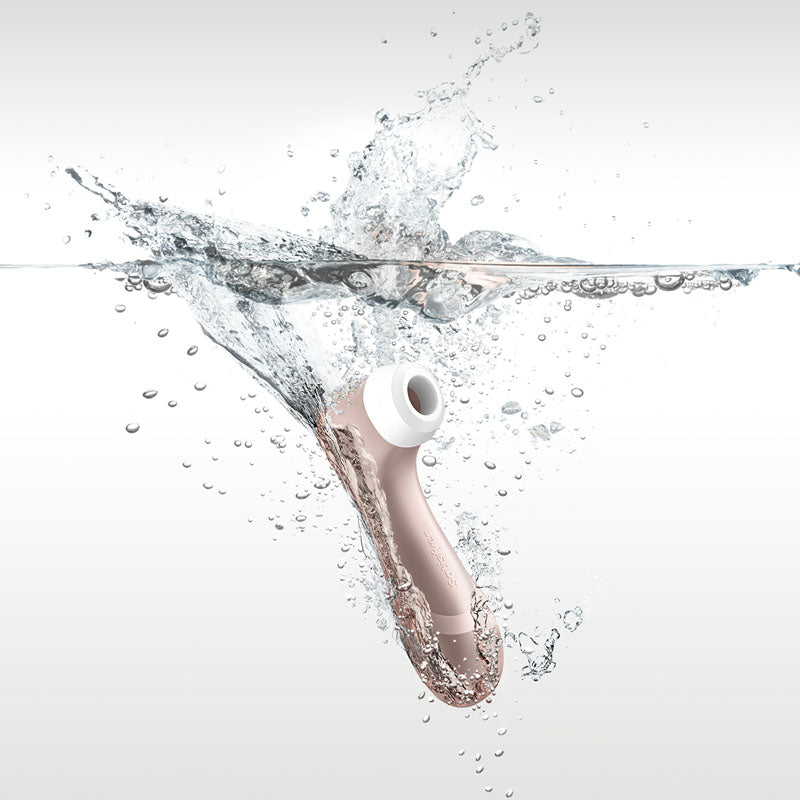 Satisfyer Pro 2 -  - Touch-Free USB-Rechargeable Clitoral Stimulator splashing into water with bubbles.
